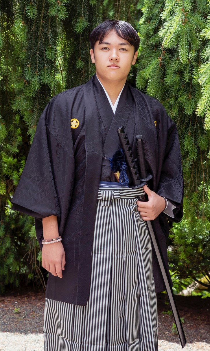 Kaiyu in kimono in Japanese garden